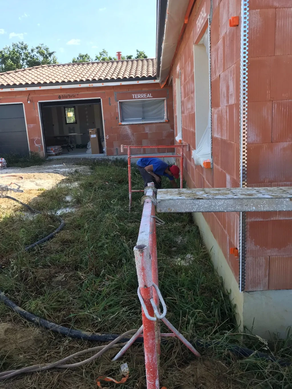 Pose de couche d'enduit sur une maison neuve à Agen